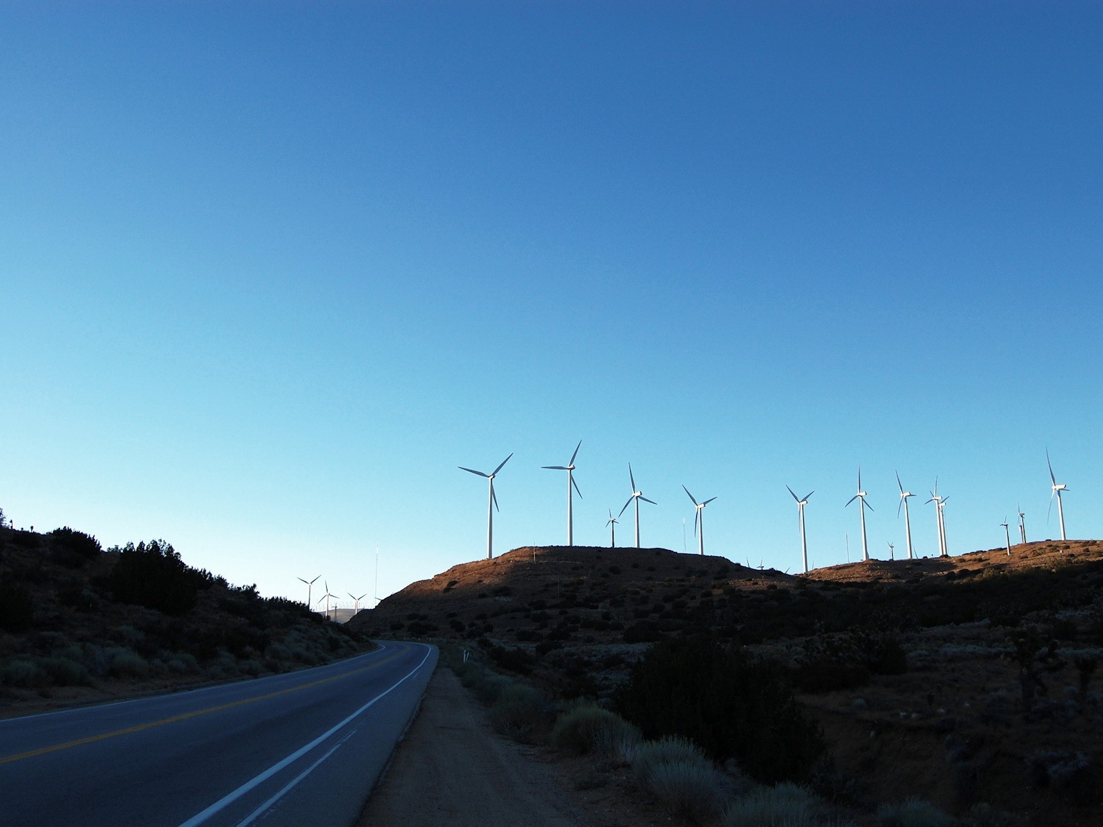 road blue wind turbine