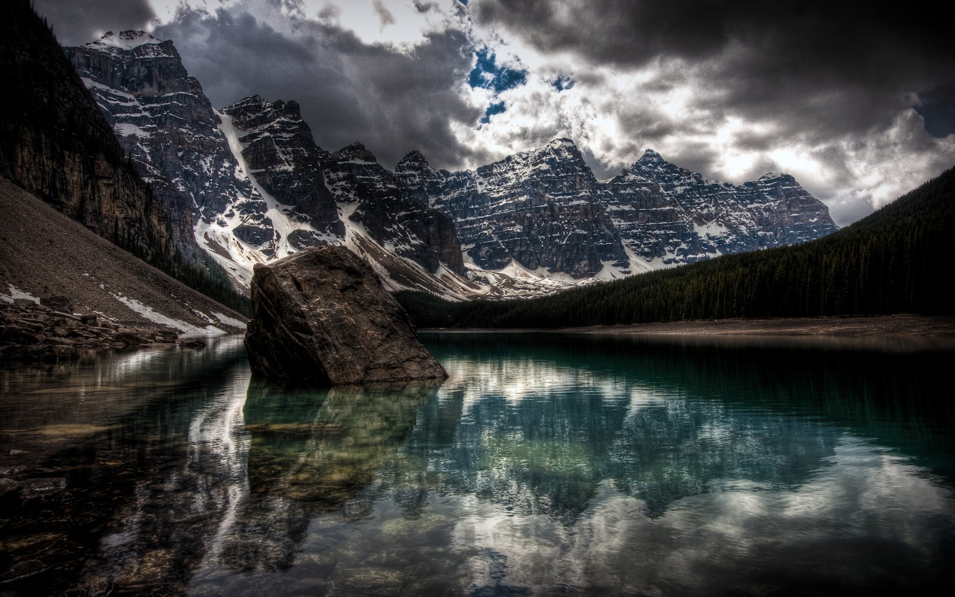 mountain lake snow clouds darkne