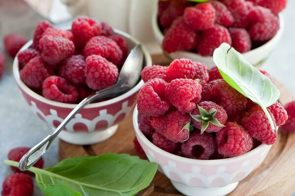 Fresh raspberries for breakfast in a cup