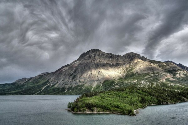 High mountains eclipsed by clouds