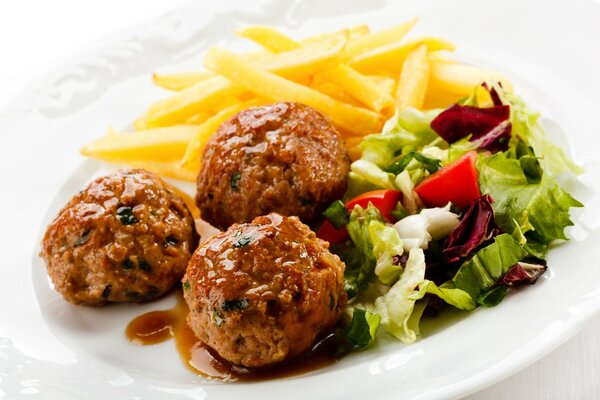 Meatballs with French fries. Supper