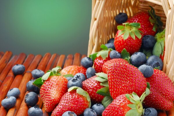 Red strawberries and ripe blueberries