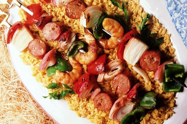 Exotic dishes: rice and seafood kebab