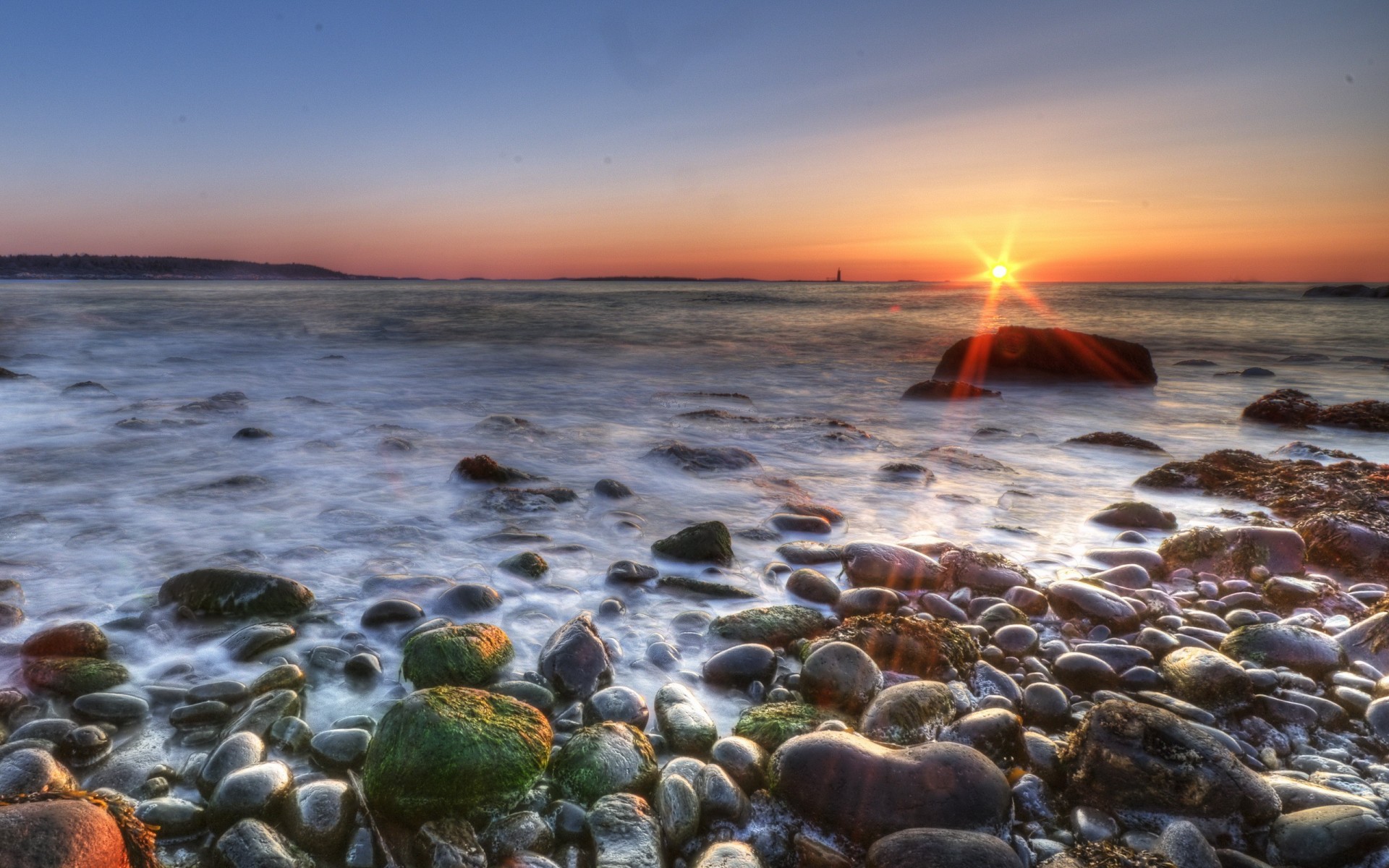beach stones sea sun