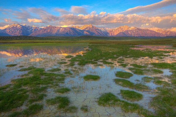 Mountain peaks reflected in the water