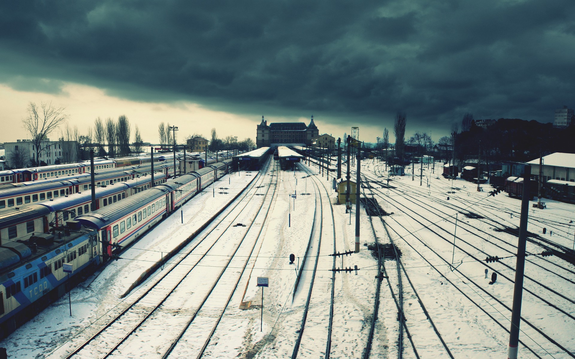 tation train loneliness winter wire clouds railroad