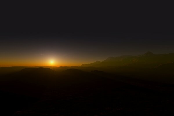 Le soleil passe au-delà de l horizon. Désert noir