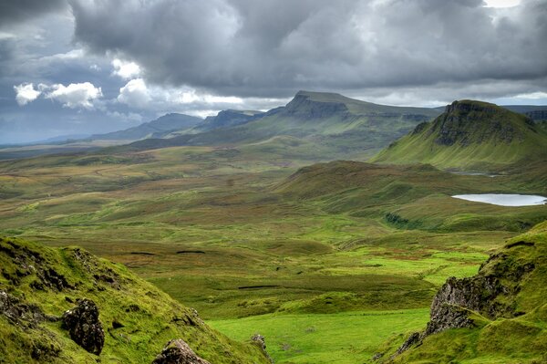 Mountains and meadows are located in Scotland