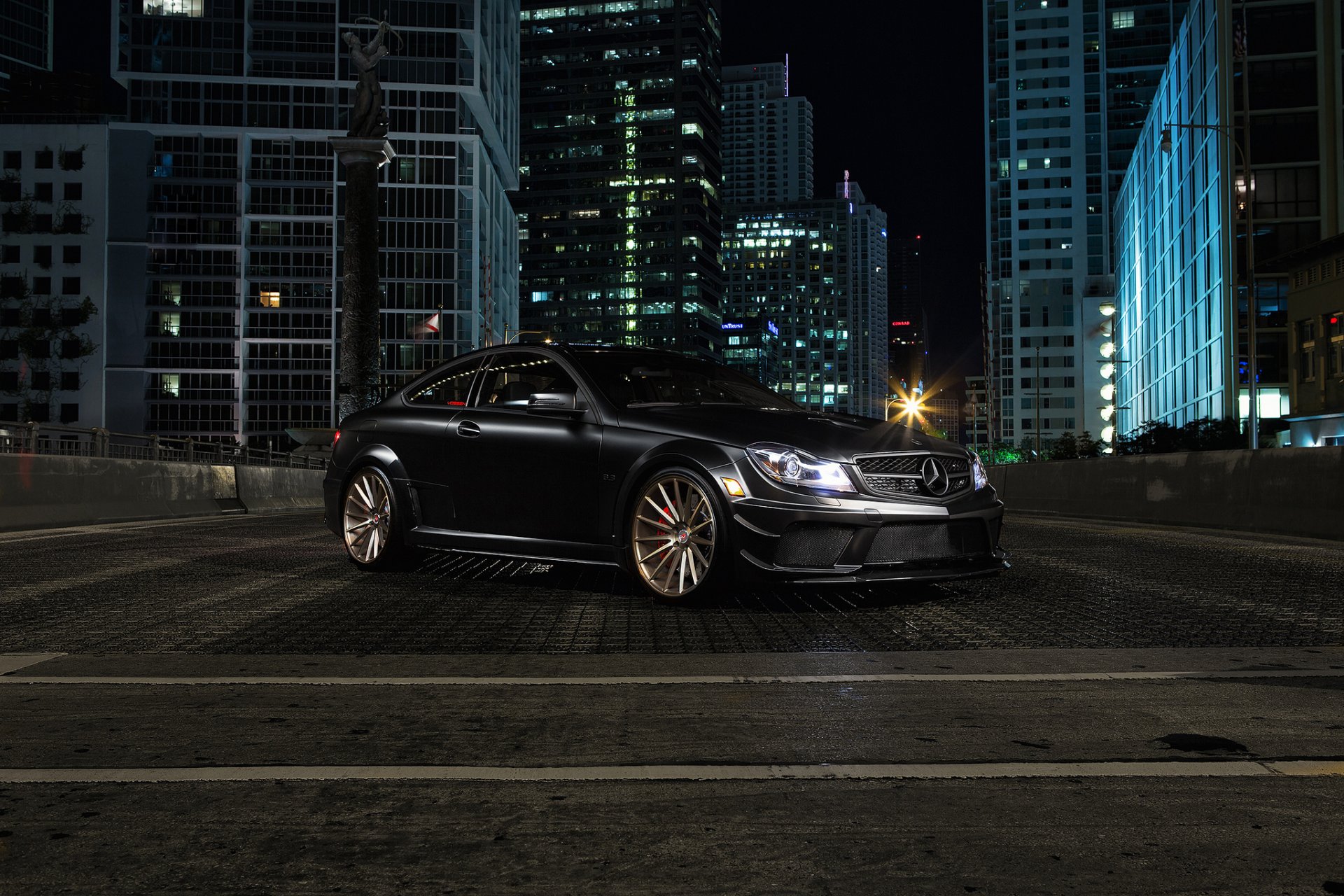 mercedes-benz c-klasse c63 amg black front town building