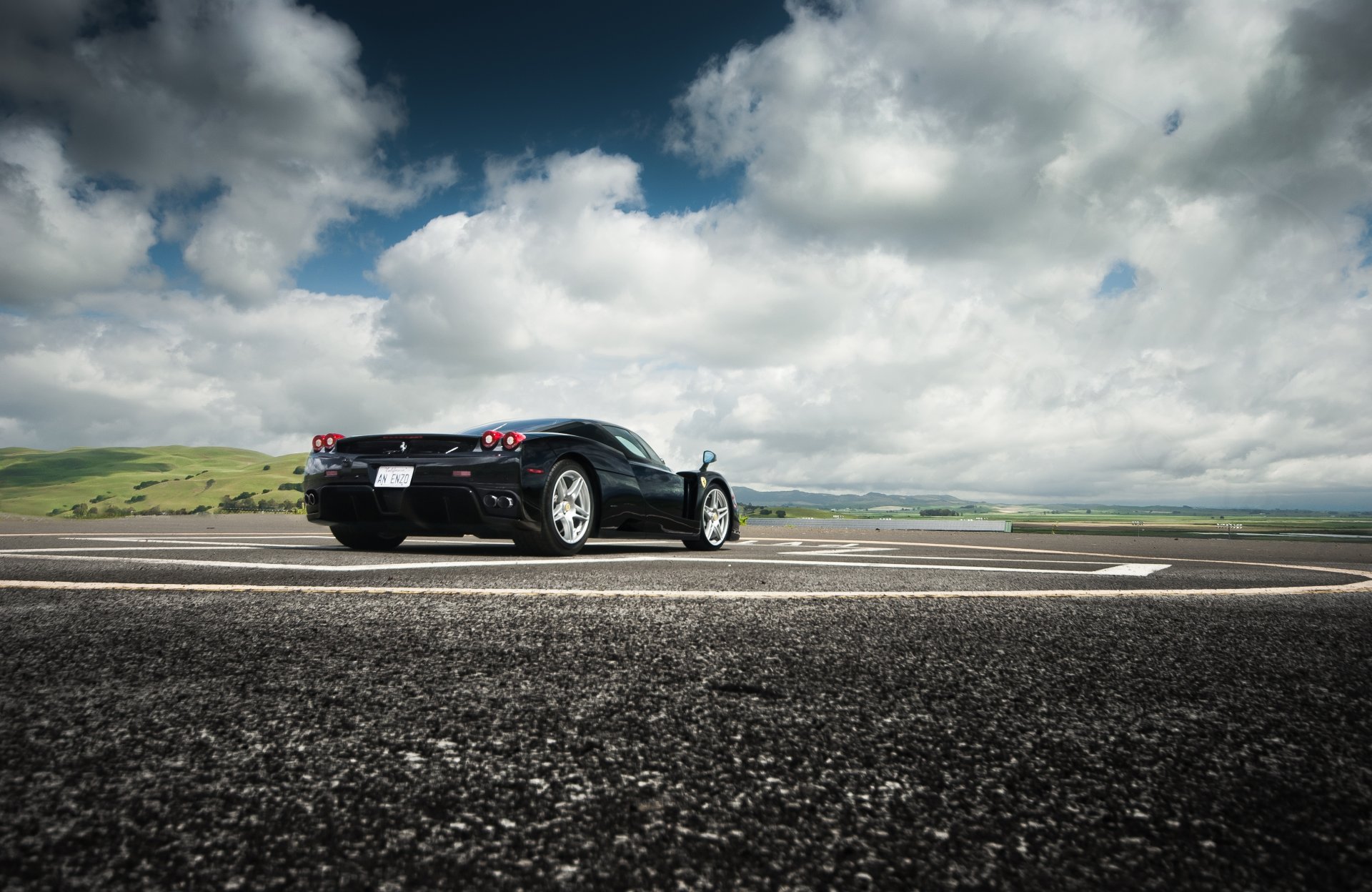 ferrari enzo black ferrari sky clouds hill