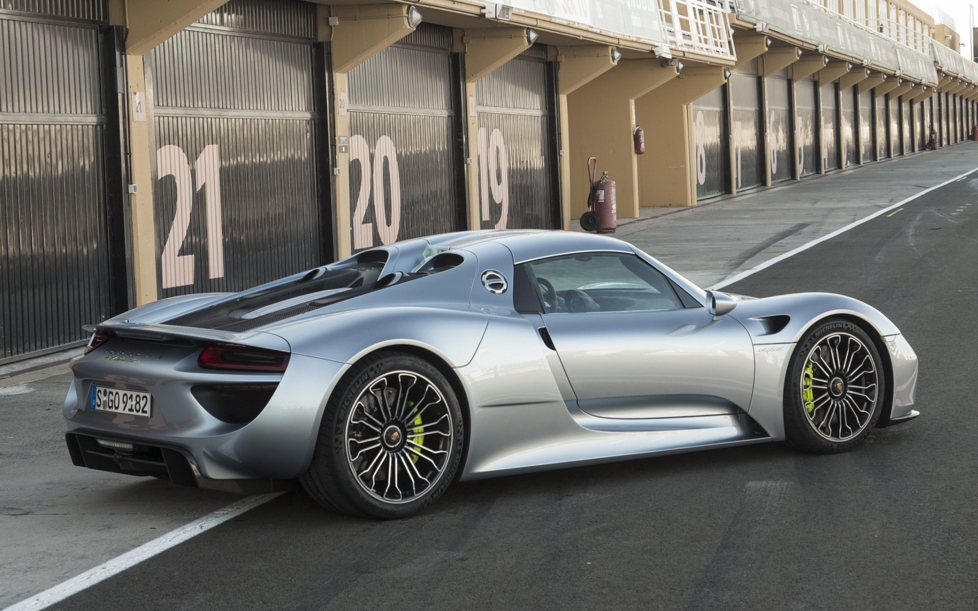 porsche spyder porsche spider supercar rear view garage background