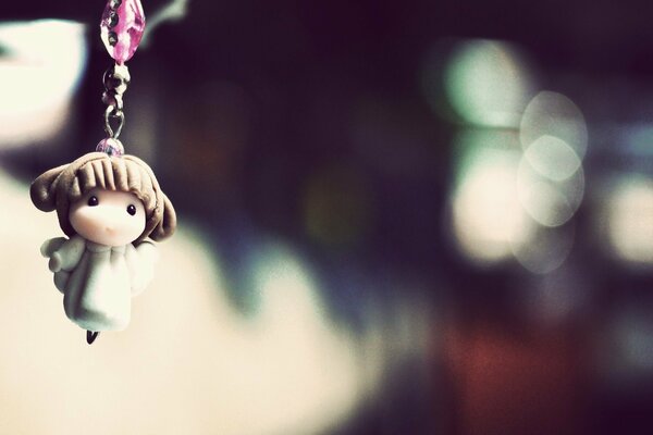 Angel figurine on a blurry background