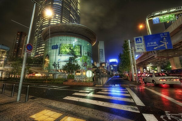 Japanese City Street with multicolored night lighting