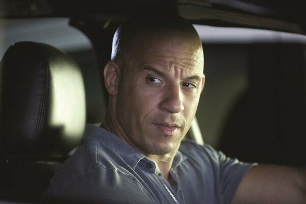 Vin Diesel in the car in the dark