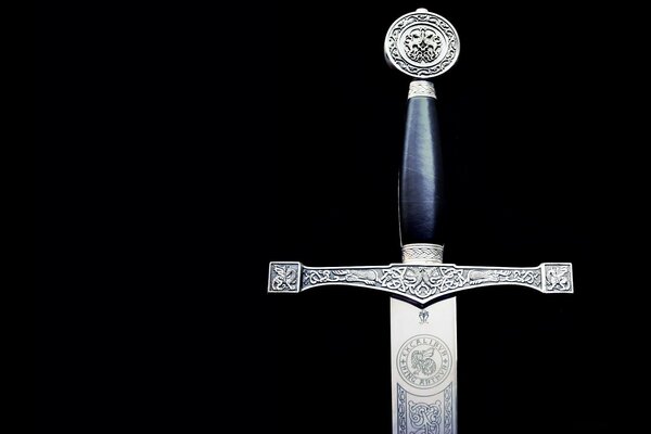 The legendary sword of King Arthur excalibur on a black background