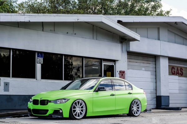 Bmv 330d green is standing near the house