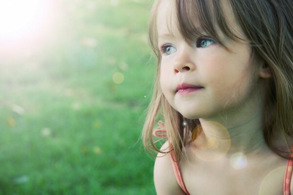 Portrait of a girl in sunny azure