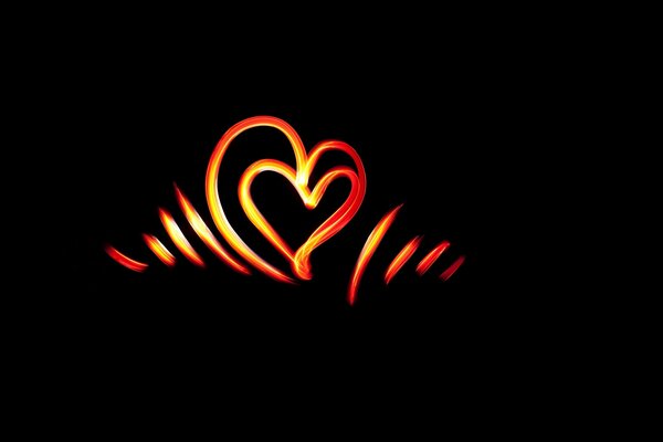 A heart of fiery lines in the dark