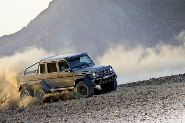 Grey mercedes-Benz g63 6x6 in dust