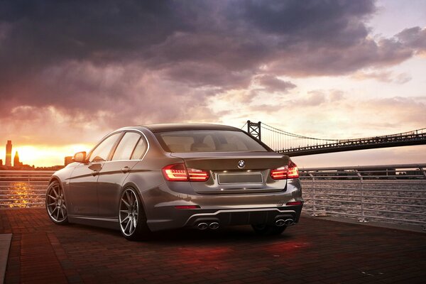 Car at sunset at the bridge