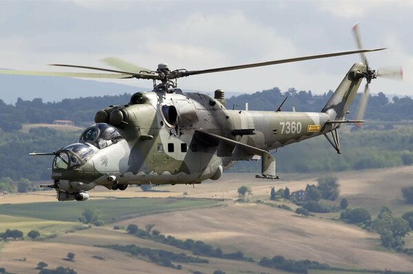 Transport and combat helicopter begins takeoff