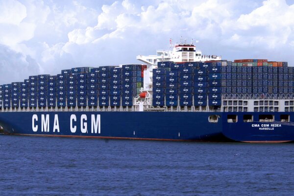 Cargo ship at sea. A huge ship. The Blue Sea