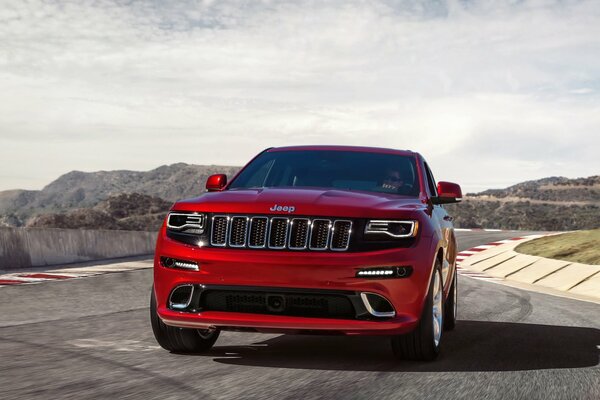 A red Jeep. Car. Front end