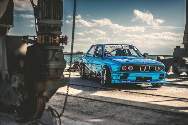 Blue BMW on a blue sky background