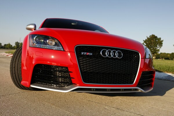 Beautiful red Audi with tinted front window