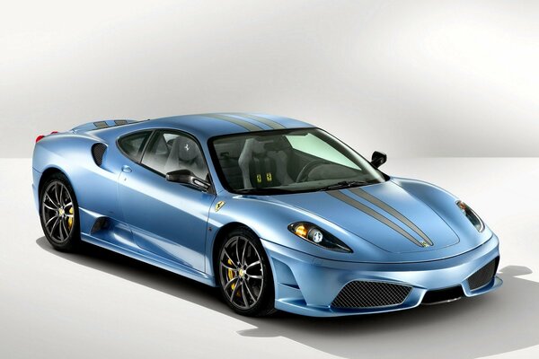 The Ferrari Scuderia car is the color of the sea wave