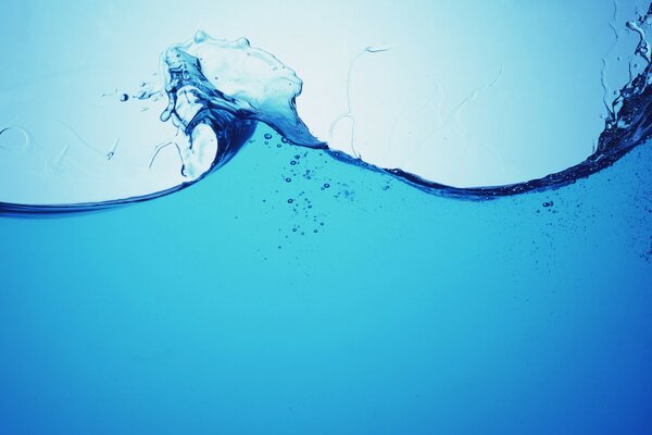The splash of water. Blue waves