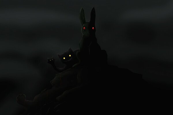 Glowing eyes of a hare and a cat in the dark