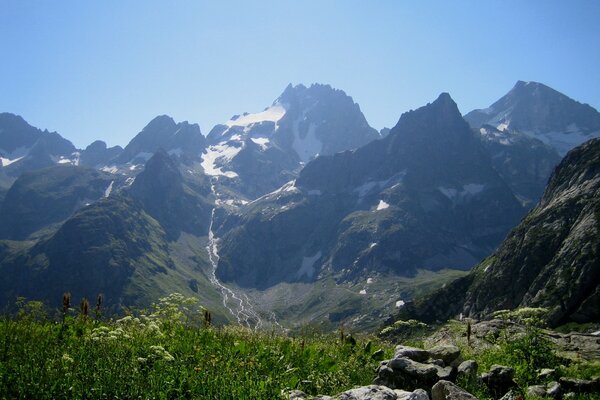 View of the Caucasus mountains from the grass