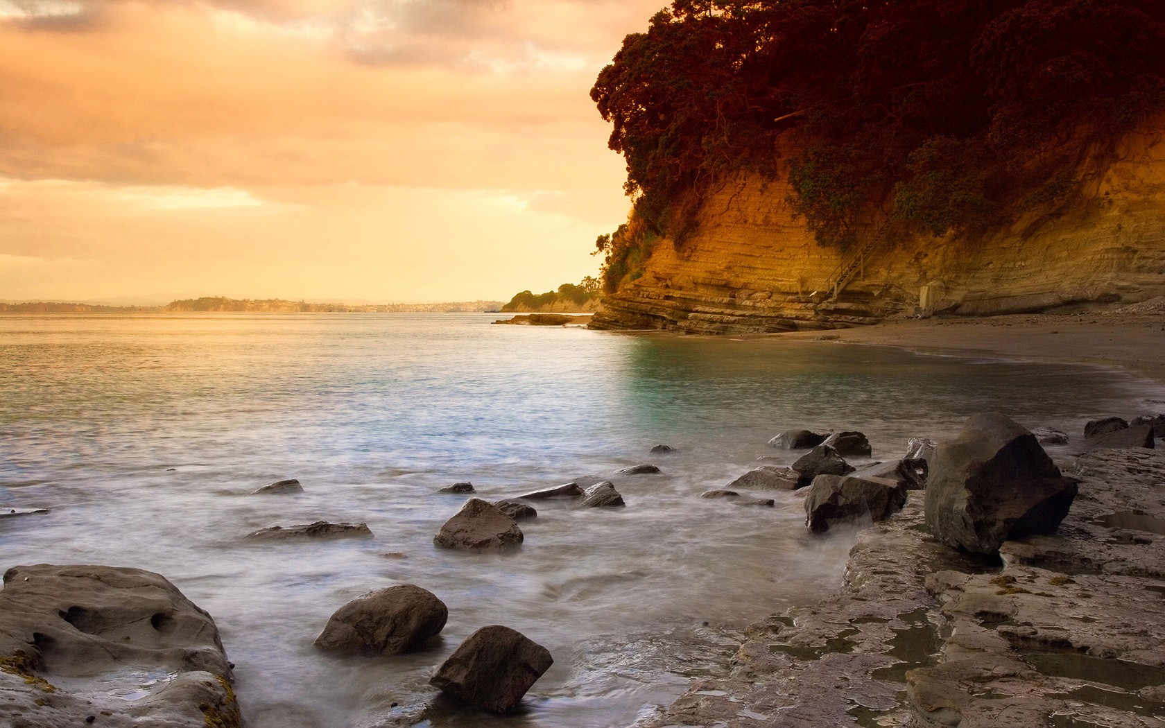 puesta de sol playa auckland nueva zelanda