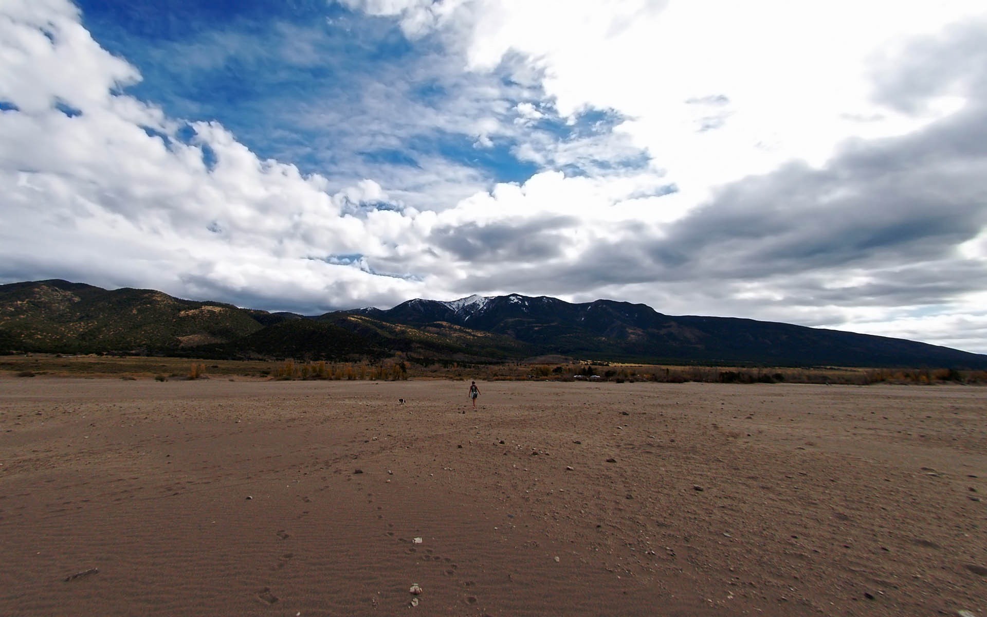 mountain sand man traces cloud