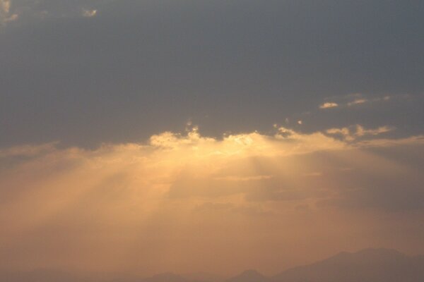 Sunset on the sea in cloudy weather