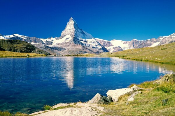 Clear lake on the background of a high mountain