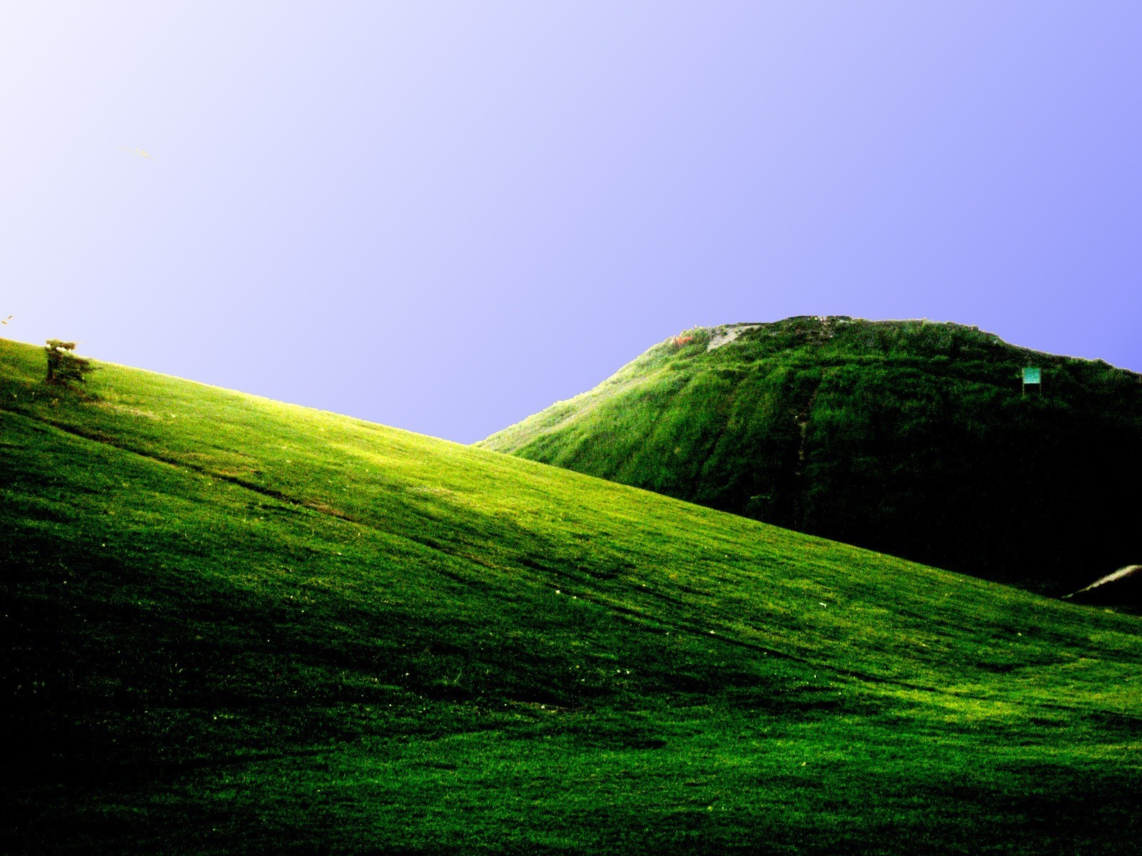 campos verdes montañas colinas