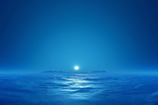 La mer bleue sans fin et la lune au loin