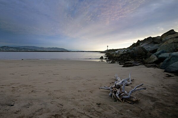 Sunset on a deserted rocky beach
