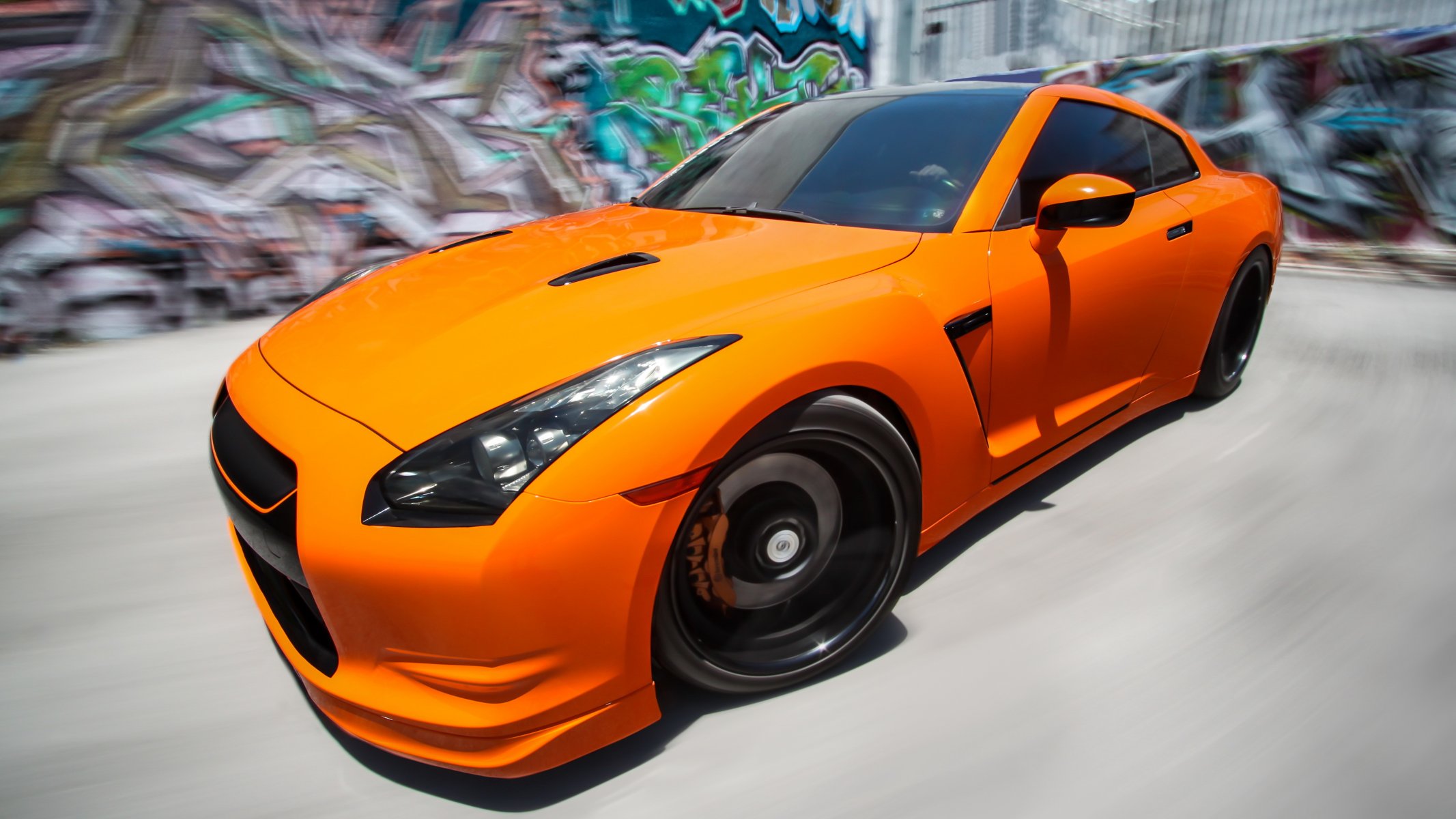 nissan gtr r35 pomarańczowy tuning prędkość rozmycie graffiti przód