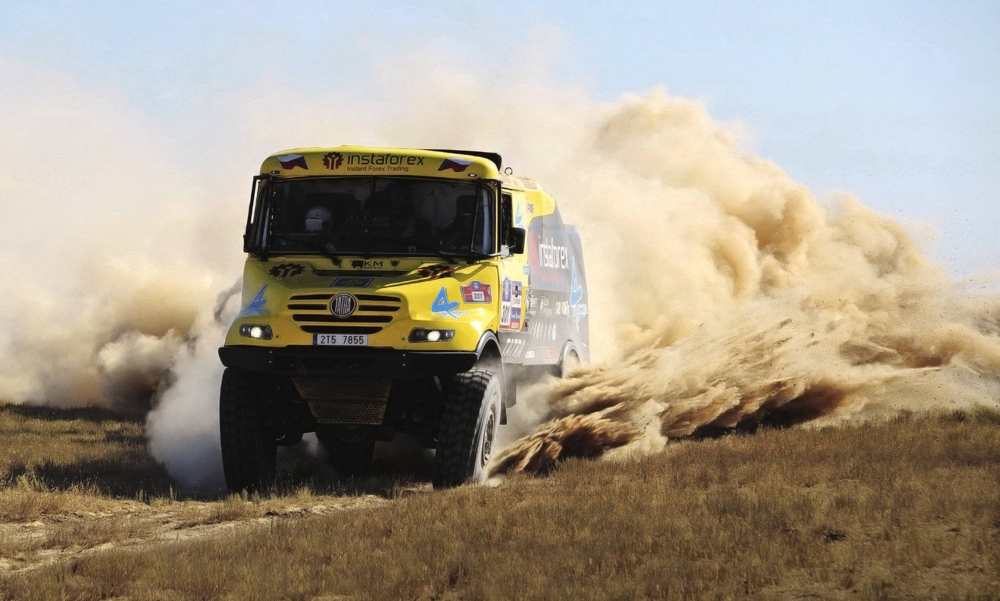 tatra dakar rally yellow truck dust sand race day front