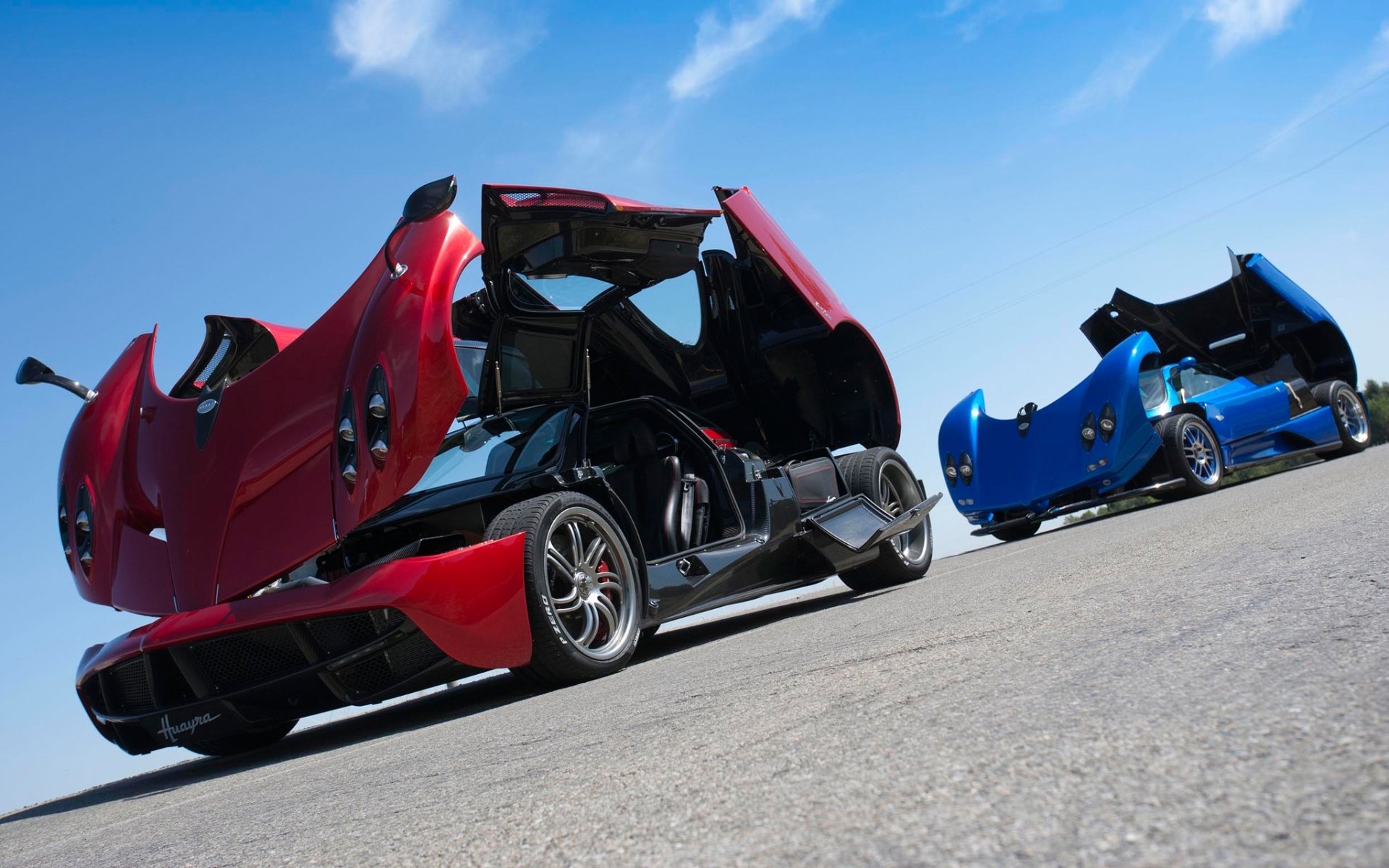 pagani zonda huayra pagani zonda huayra supercars red blue front sky