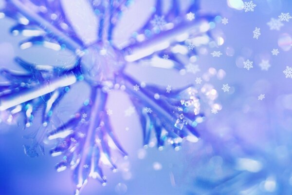 Fiocco di neve blu scintillante, festoso, sfondo di Capodanno