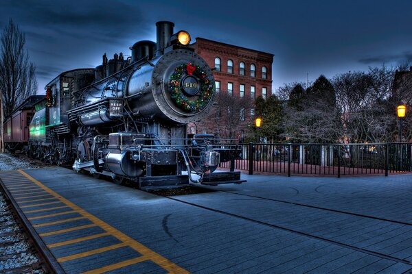 Steam locomotive decorated with a Christmas wreath