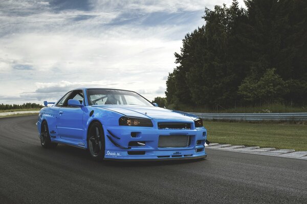 Blue Nissan skyline on the horizon