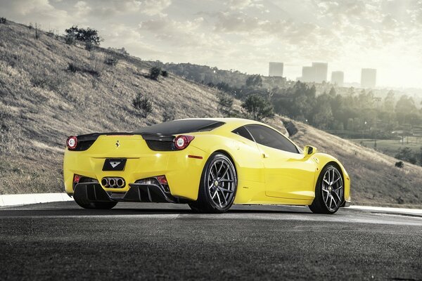 Yellow Ferrari 458 italia car on the road side view