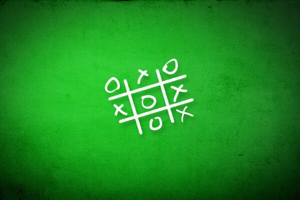 Game tic tac toe on a green background