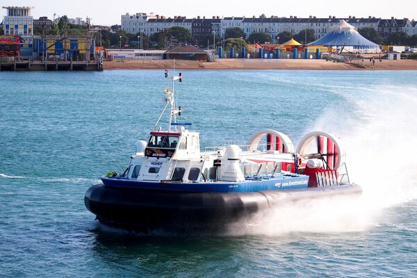 Hovercraft in the Bay unfolds with spray