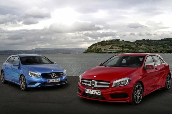 Red and blue mercedes-benz a-klasse cars